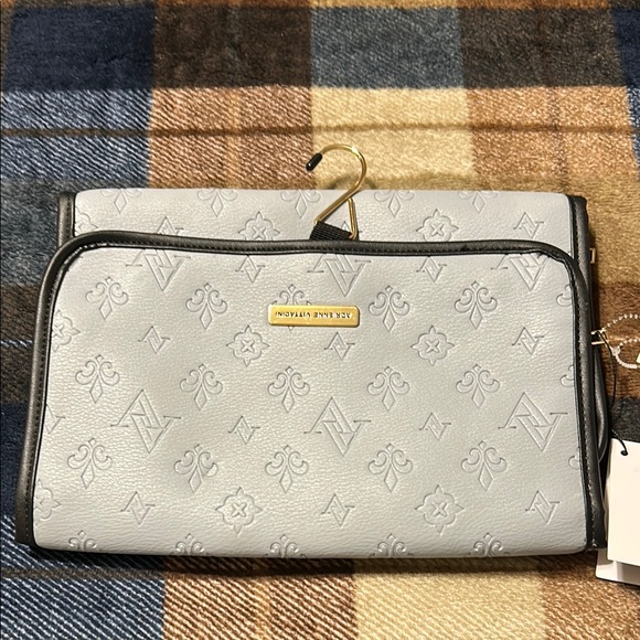 Adrienne Vittadini Handbags - NWT Gray Cosmetic Bag (giveaway 1)